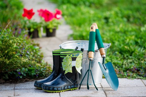 Soft landscaping in Hither Green with shrubs, flowers, and decorative planting